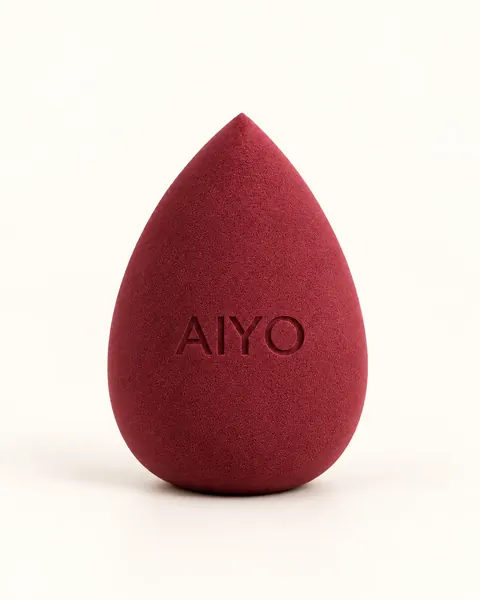 Бордовый спонж-капля AIYO с округлой основой и заострённым кончиком