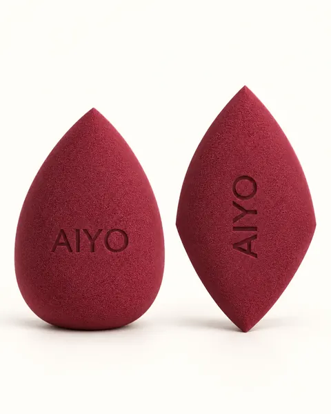 Два бордовых спонжа AIYO: капля и скошенная форма